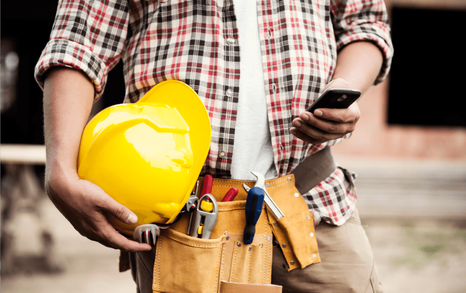 Construction worker on his phone