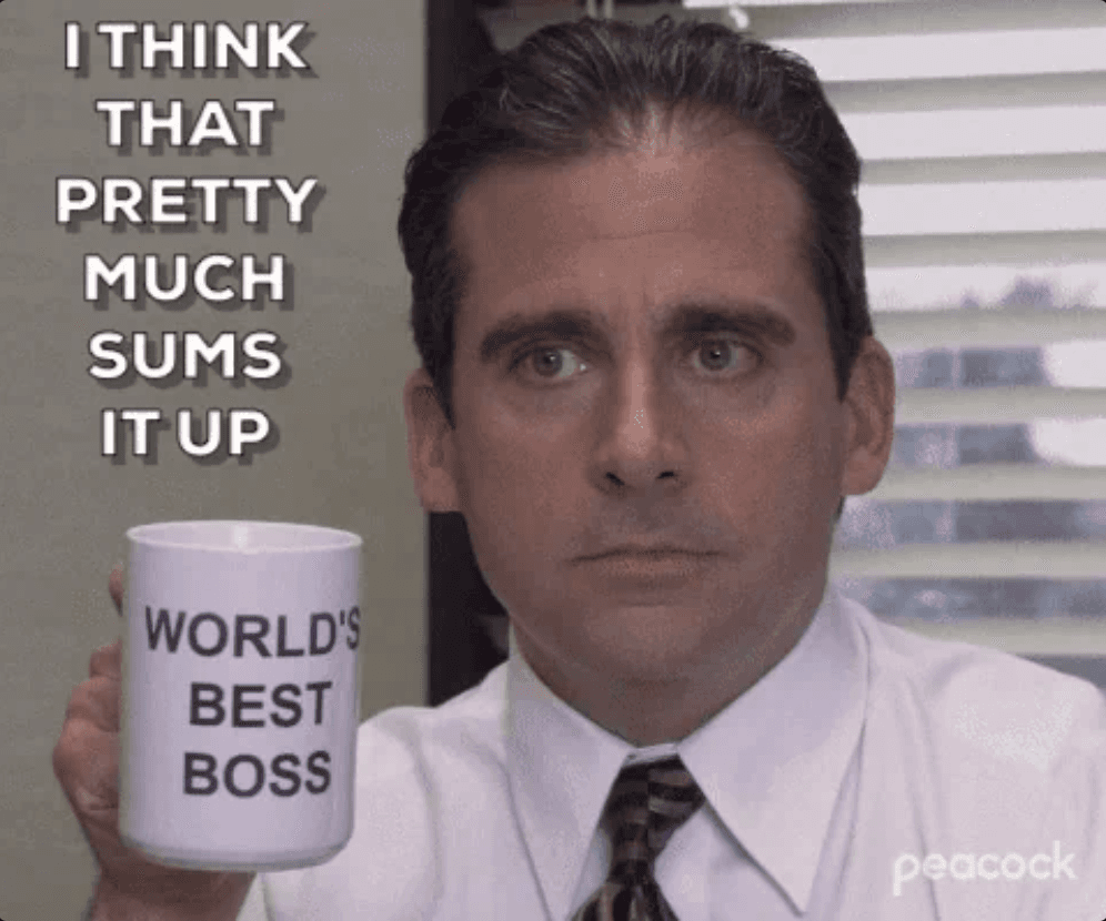 Steve Carell from The Office holding mug that says "World's best boss"