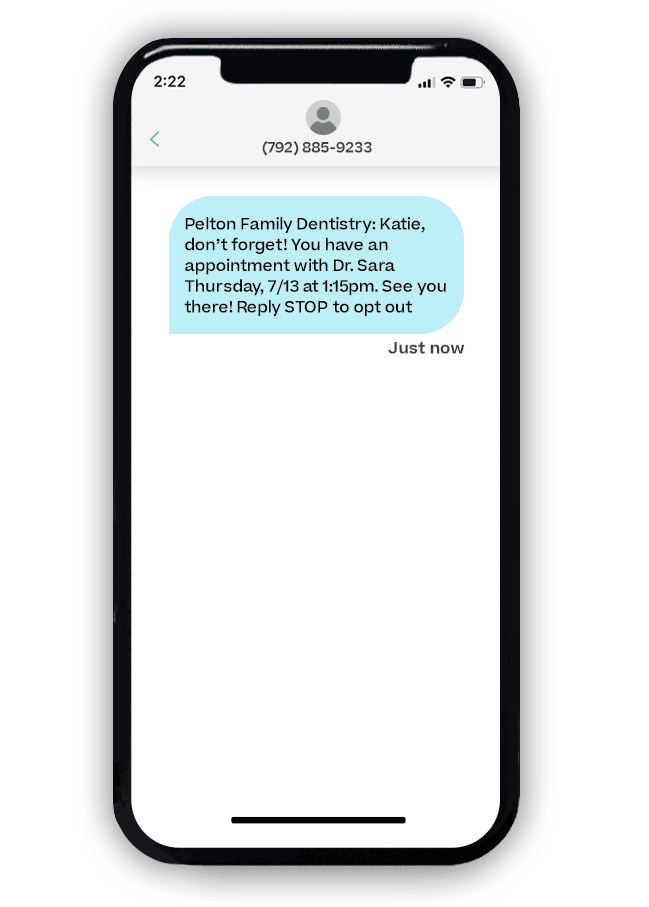 Phone receiving text reminder for dentist appointment