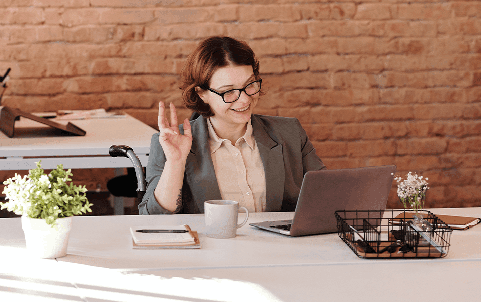 Disabled business person video chatting with someone