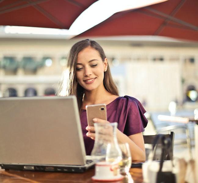 Person at a restaurant on phone