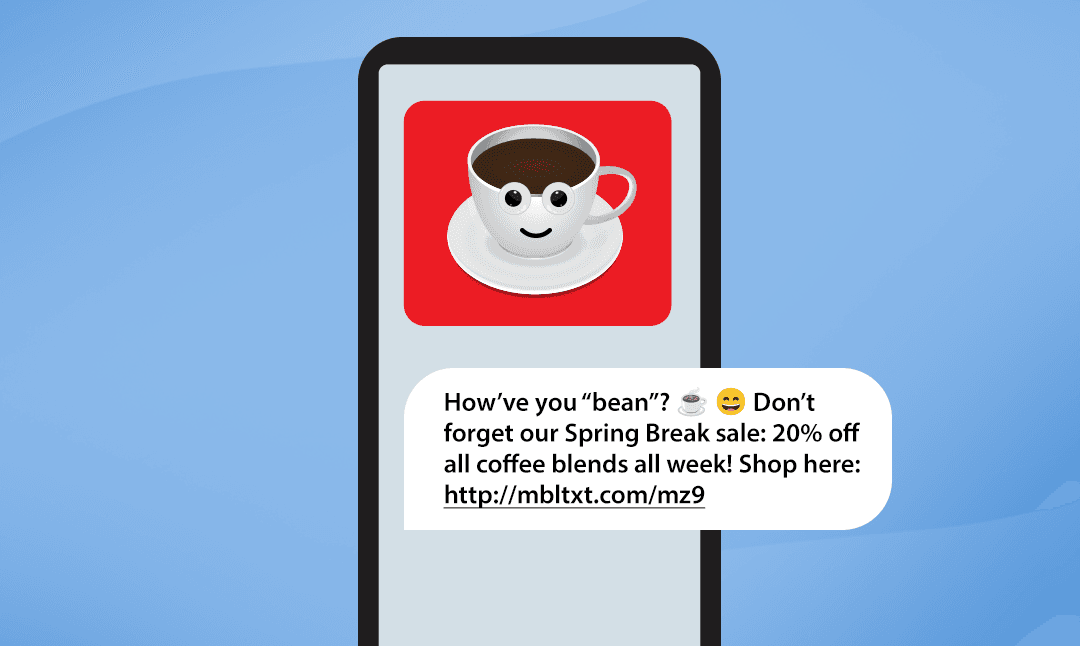A phone with an MMS showing a picture of a coffee cup with googly eyes and a smile with the corresponding text message below