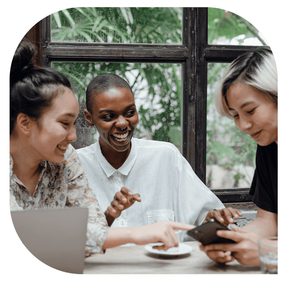 Three woman participating in a mobile survey