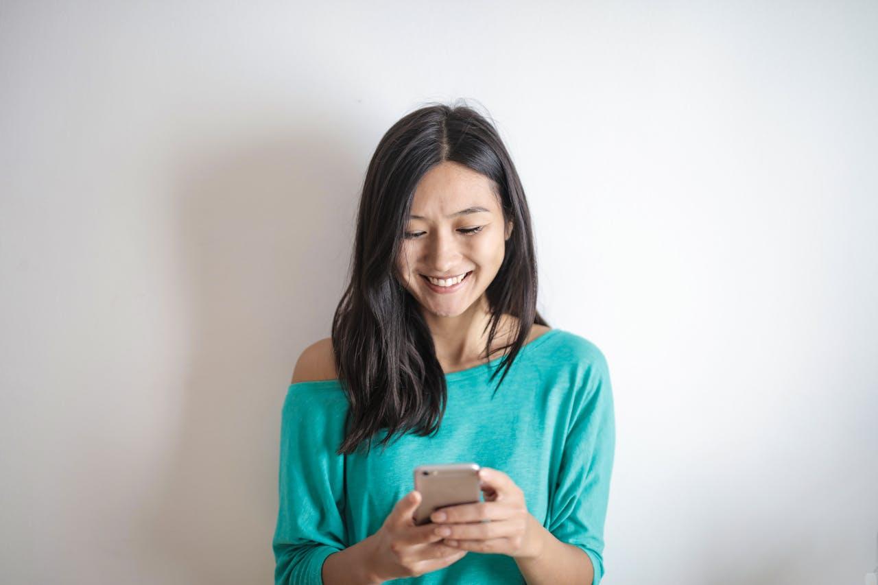 Young woman texting