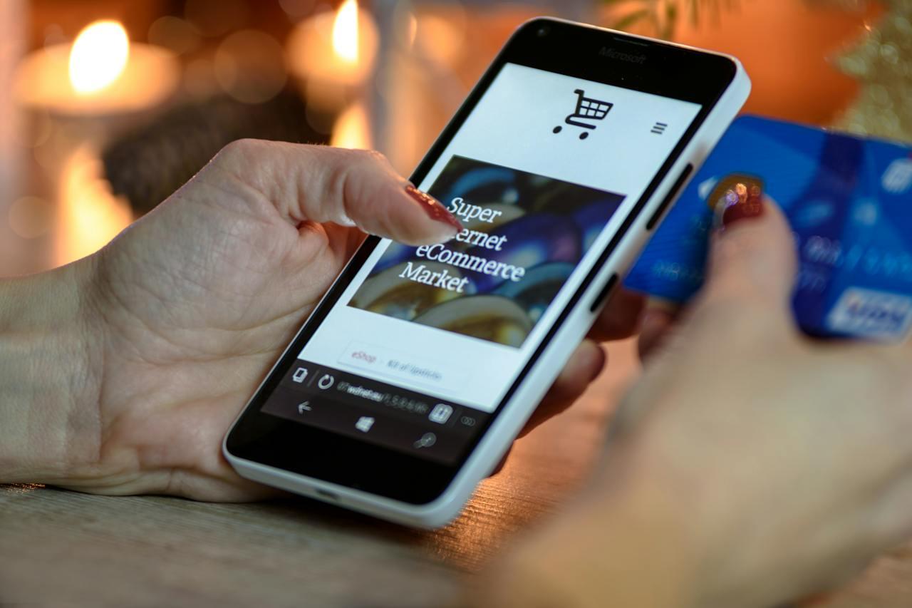 Woman making purchase on her phone