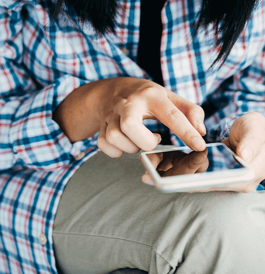 Woman sitting and texting