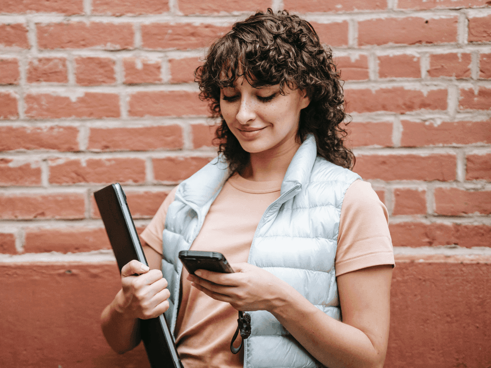 young woman replying to text