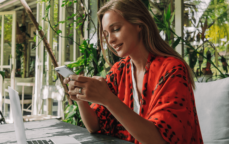 Happy woman texting