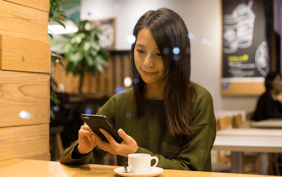 Woman receiving text message