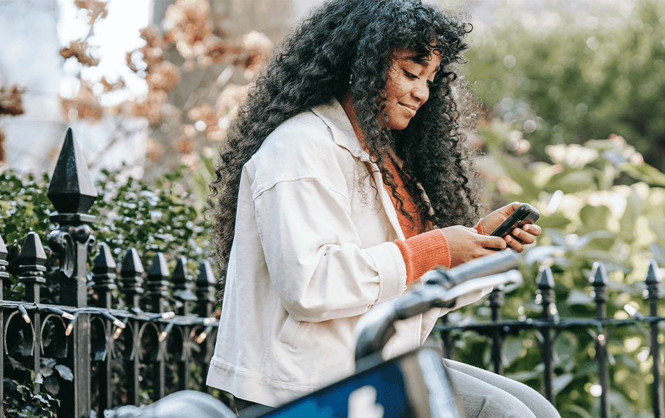 woman texting outside