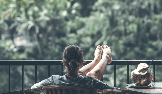 woman relaxing on a balcony