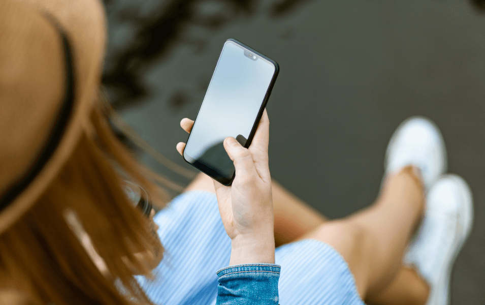 Woman is using an SMS short message service