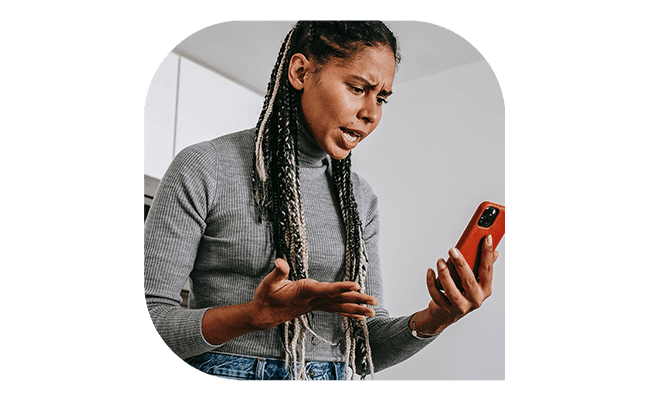 Frustrated woman looking at phone