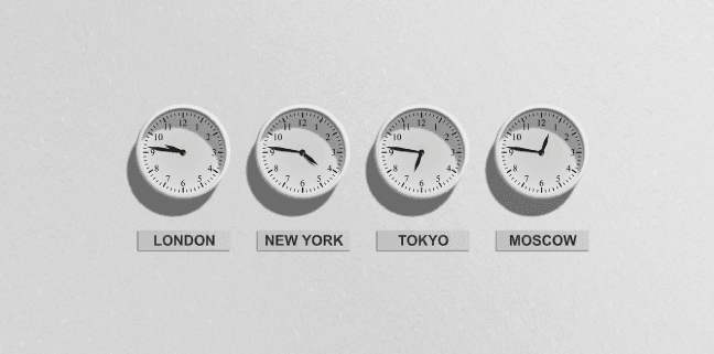 4 clocks on a wall showing the time in London New York Tokyo and Moscow