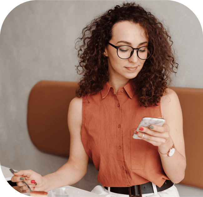 Business woman looking at SMS delivery reports