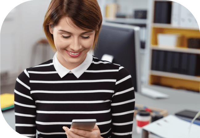 Business woman uses SMS opt in on her mobile device